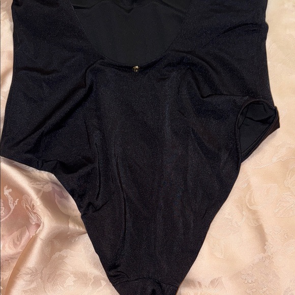Elegant Black Swimsuit with Gold Accents - Picture 8 of 8